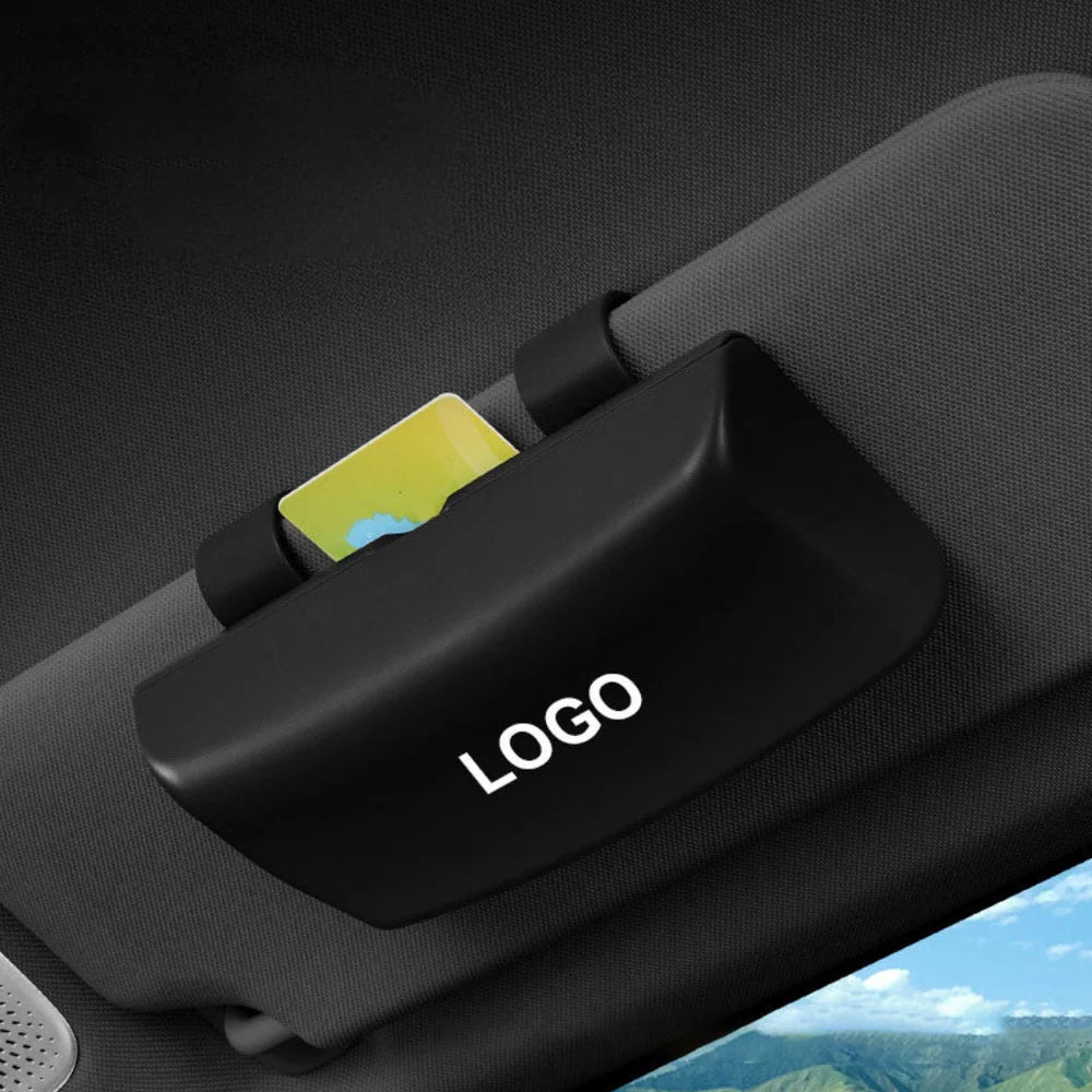 Glasögonhållare för solskydd